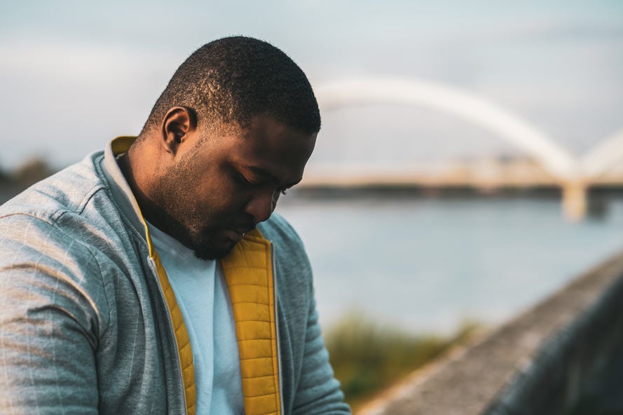 African-American man looking down